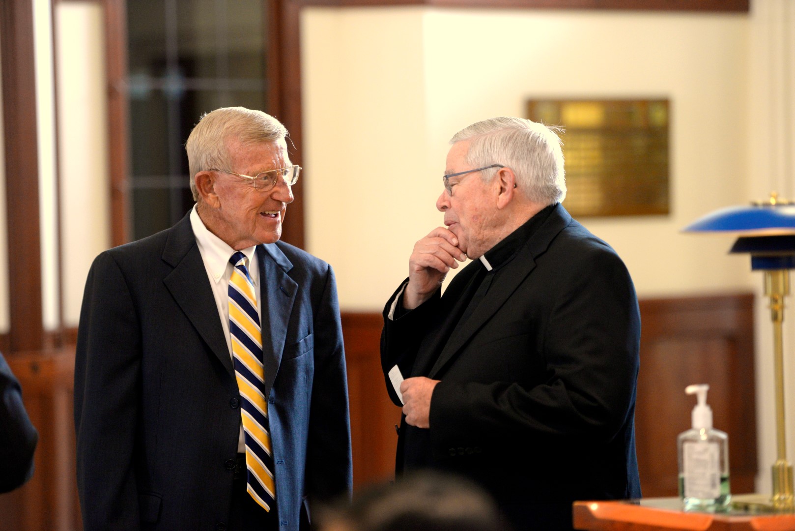 Fr. Joe Carey shares a memory with Lou