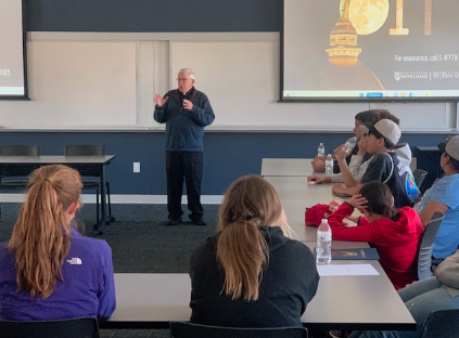 Fr. Joe Carey, CSC talking to middle schoolers of AICSN schools