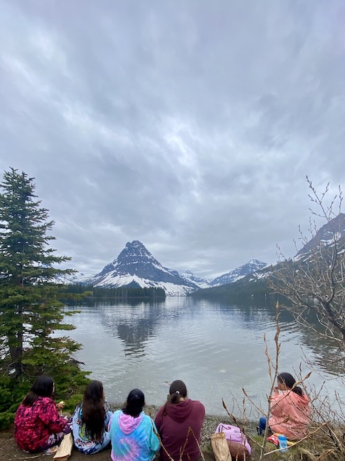 Students sitting outside