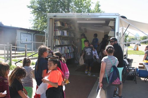 Students inside the bookmobile