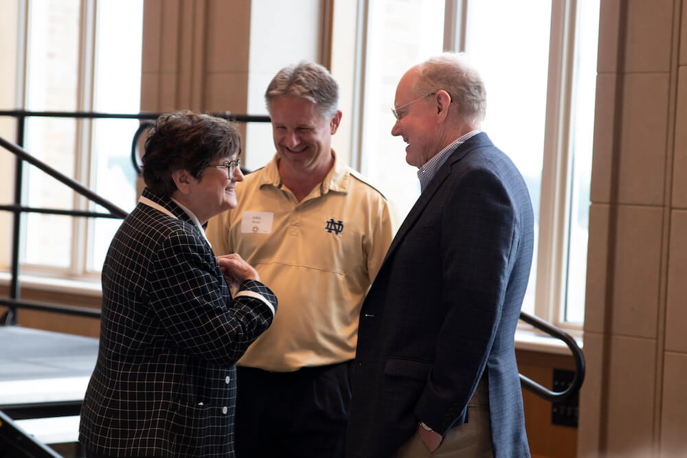 Sr. Helen shares a story with the Acting Director of the Institute for Educational Initiatives, Dr. John J. Staud, and Fr. Timothy Scully, C.S.C., the founder of the Alliance for Catholic Education.