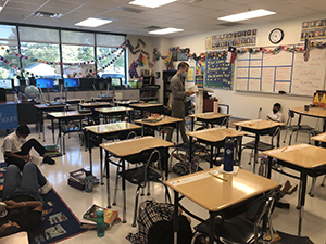Brandon in his classroom