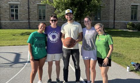 Image of ACE New Orleans on the basketball court. From left to right: Amanda Dempson, James Walsh, Jordan Pavlock, Caelan O'Connor, and Sophia Buonavolonta
